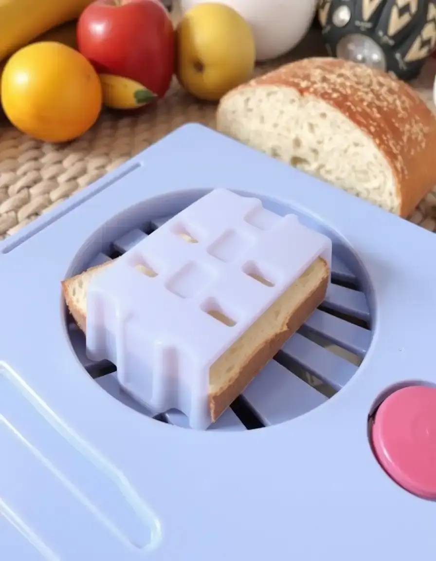 Schneidehilfe aus Kunststoff für gleichmäßige Brotscheiben